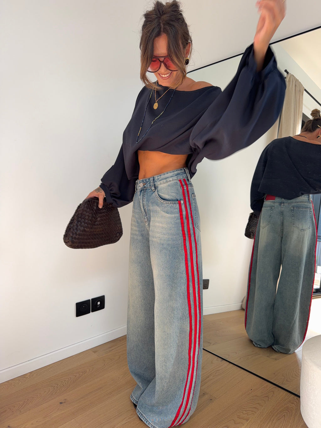 Jeans à bandes rouges