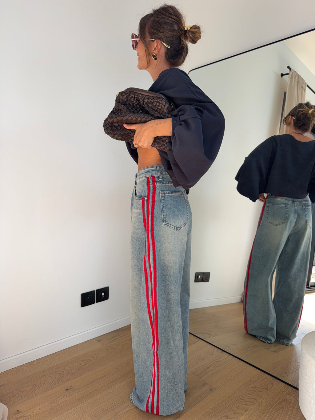 Jeans à bandes rouges