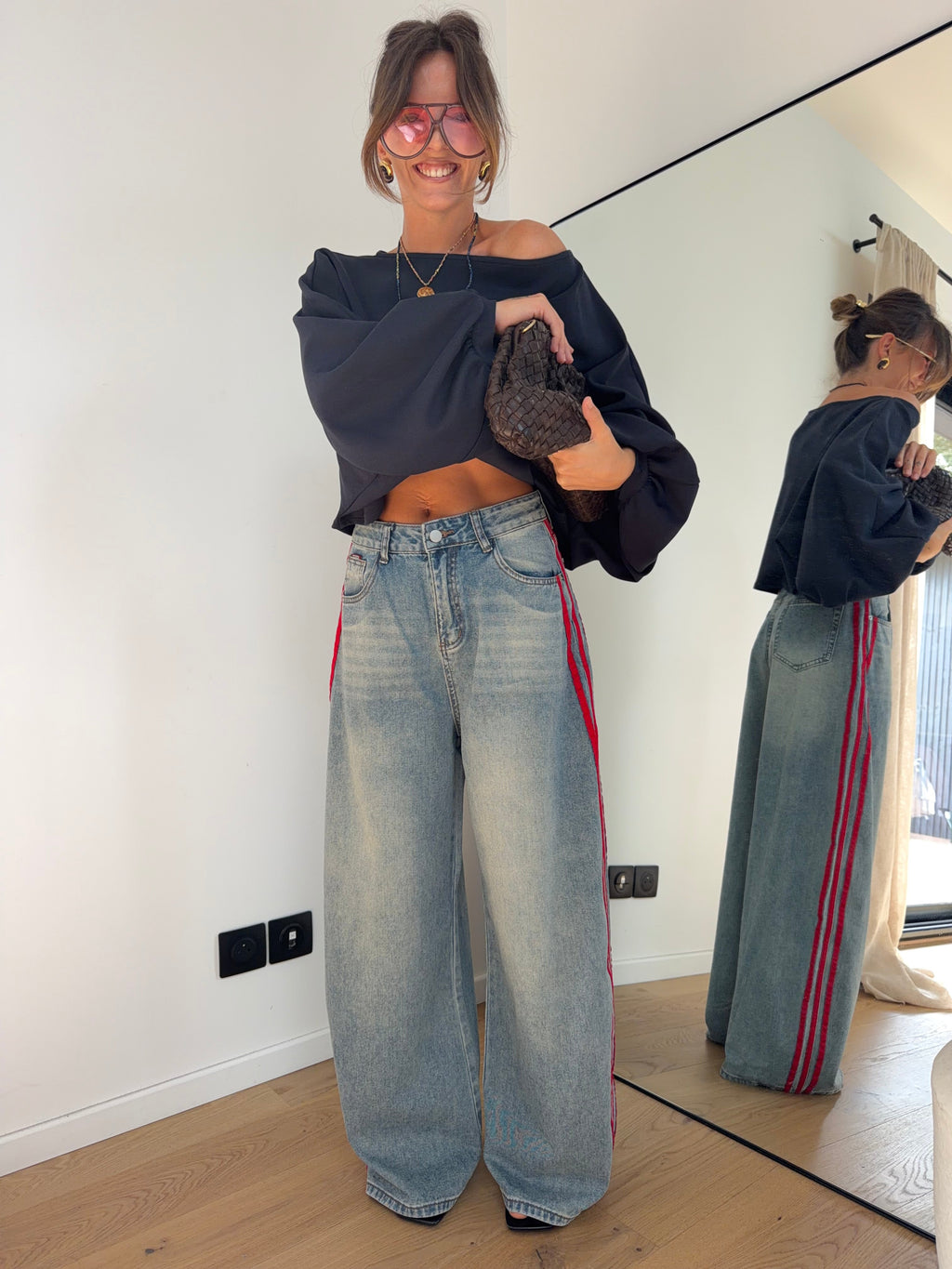 Jeans à bandes rouges